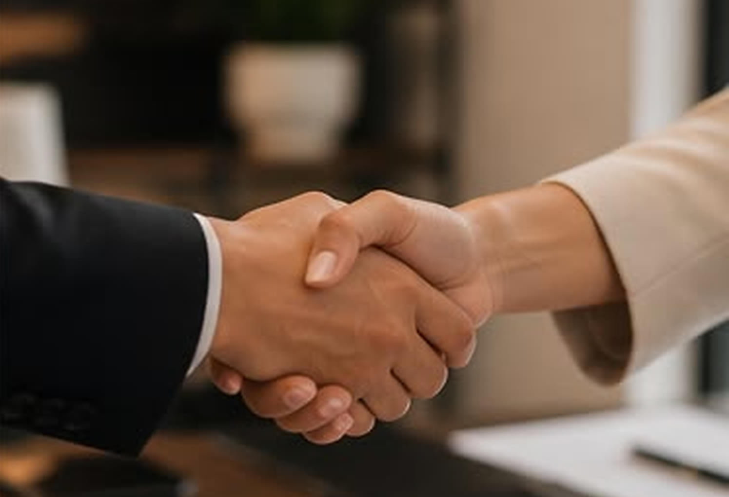 Professional handshake representing a confident next step